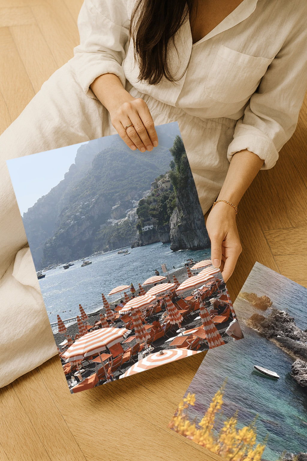 Arienzo Beach Club wall art print in Positano with rows of orange beach umbrellas against the sea. Travel photography print for coastal-inspired interiors.